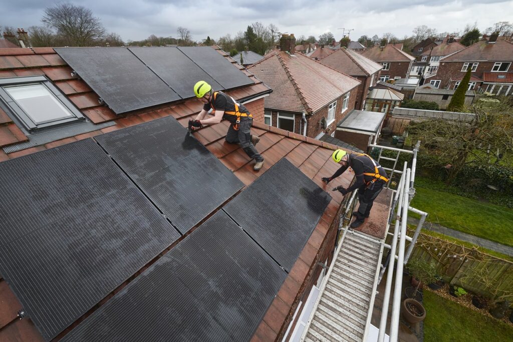 engineers installing solar pv on roof engineers installing solar pv on roof